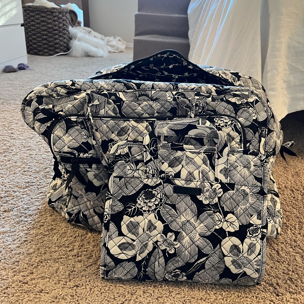 Floral black and white Vera Bradley travel bag and makeup bag set